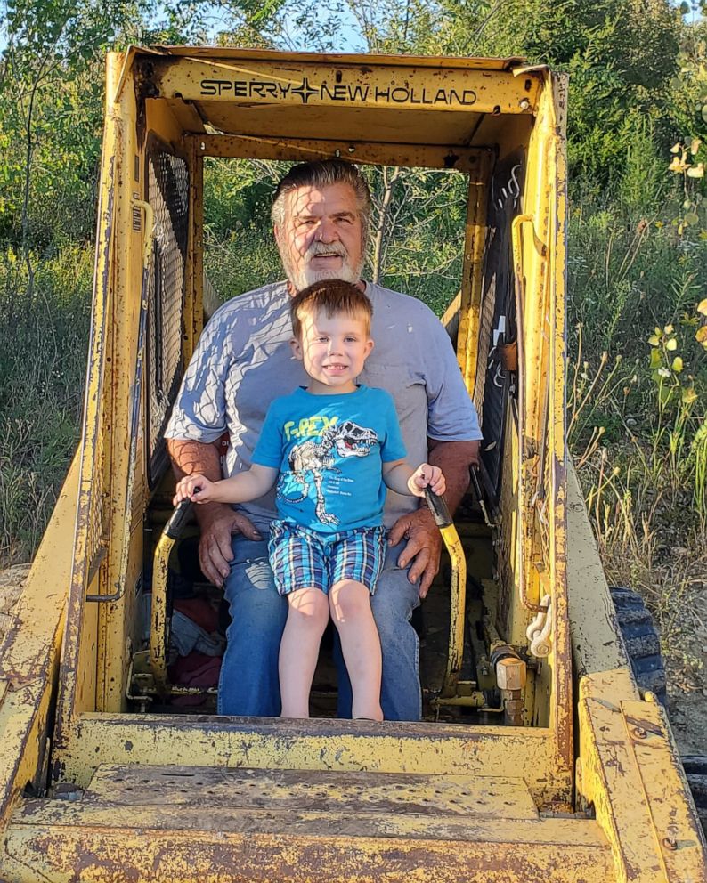 PHOTO: Steve Murphy of Thayer, Iowa, surprised his 4-year-old grandson, Murphy, in Des Moines, Iowa, as 20 cars lined up during the pandemic.