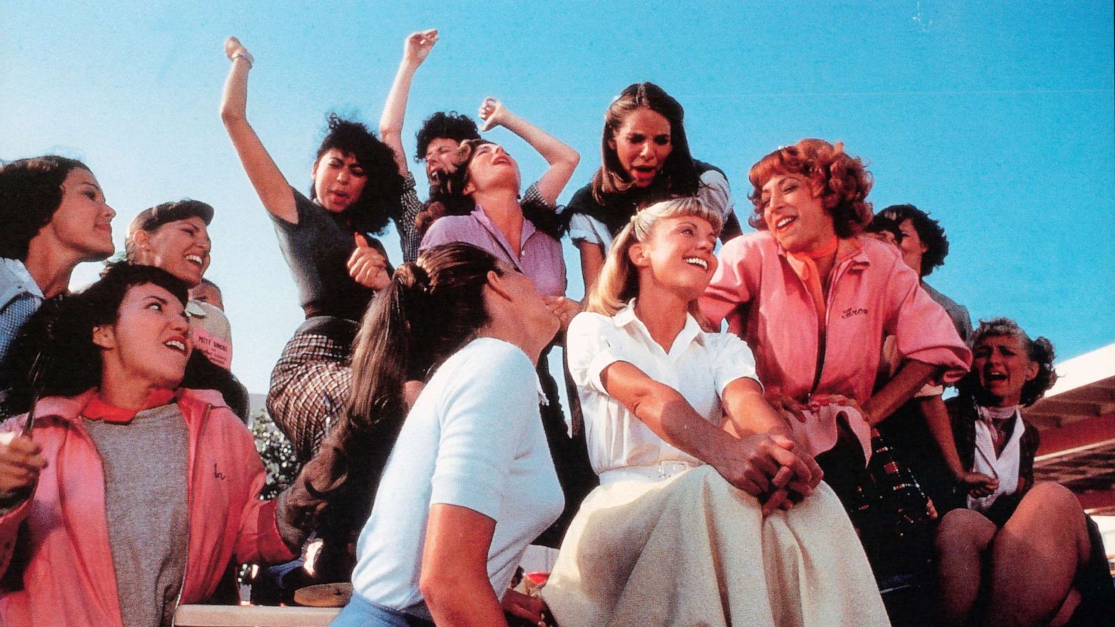 PHOTO: Olivia Newton-John, Didi Conn and the rest of the girls sing in a scene from the film 'Grease', 1978.