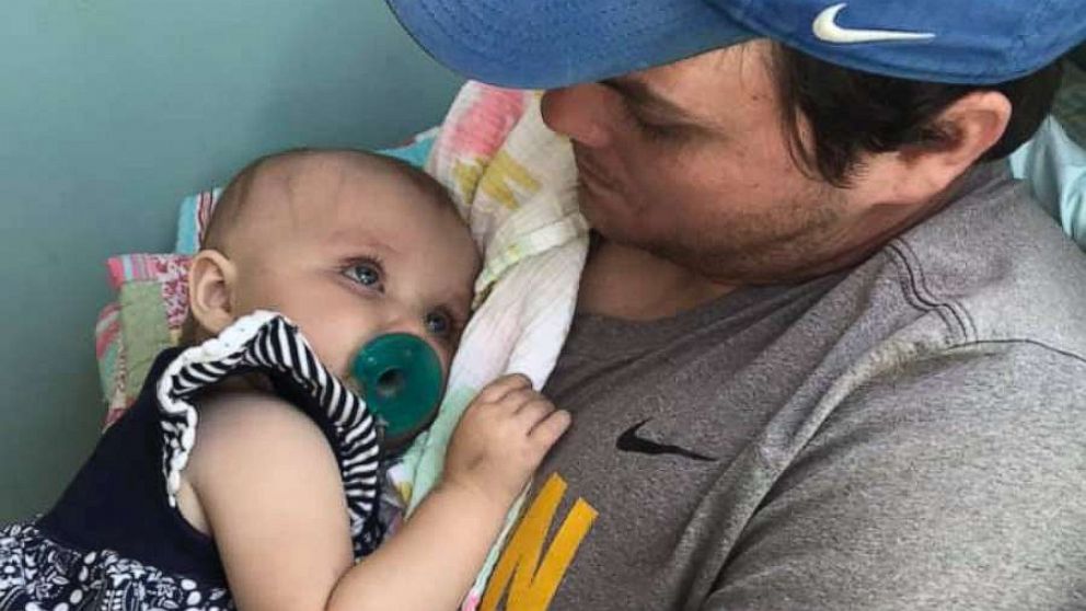 PHOTO: David Green, 31, is a history teacher and football coach at Mae Jemison High School in Huntsville, Ala. His child, Kinsley Green, is undergoing chemotherapy due to a leukemia diagnosis, which she received Oct. 22, 2018.