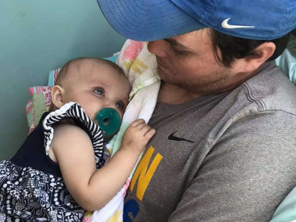 PHOTO: David Green, 31, is a history teacher and football coach at Mae Jemison High School in Huntsville, Alabama. Her child, Kinsley Green, is following chemotherapy as a result of a diagnosis of leukemia, which she received on October 22, 2018.