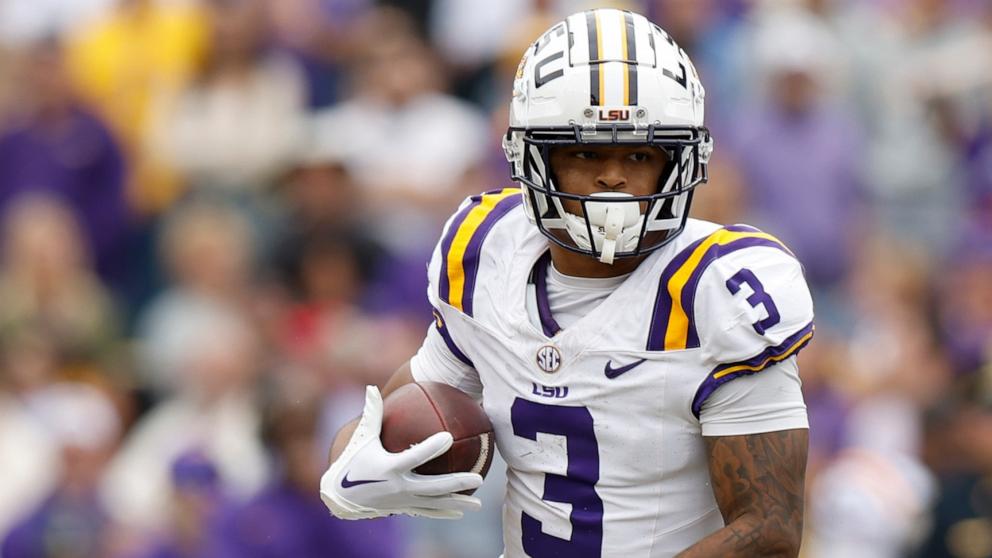 PHOTO: LSU running back Greg Brooks Jr. (3) carries the ball during an NCAA college football game against Texas A&M, Nov. 25, 2023, in Baton Rouge, La.