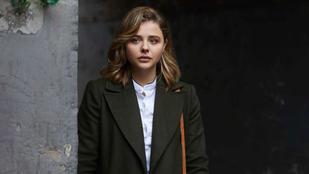 Chloe Grace Moretz catches a flight with her mom at Los Angeles