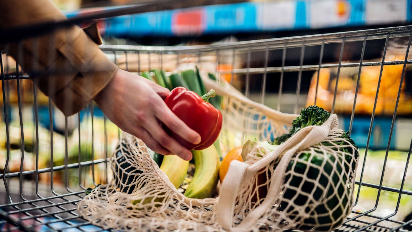 PHOTO: Stock photo of a person grocery shopping.