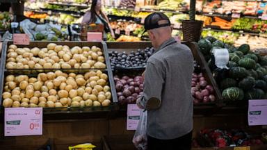 PHOTO: Customers shop in the produce section of a grocery store, May 11, 2026, in Portland, Ore.
