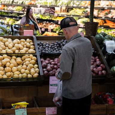 PHOTO: Customers shop in the produce section of a grocery store, May 11, 2026, in Portland, Ore.