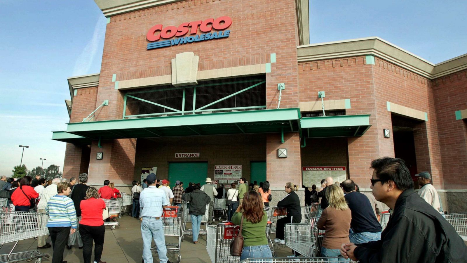 PHOTO: Shoppers wait for a Costco Wholesale store to open in the Los Feliz section of Los Angeles, Dec. 8, 2005.