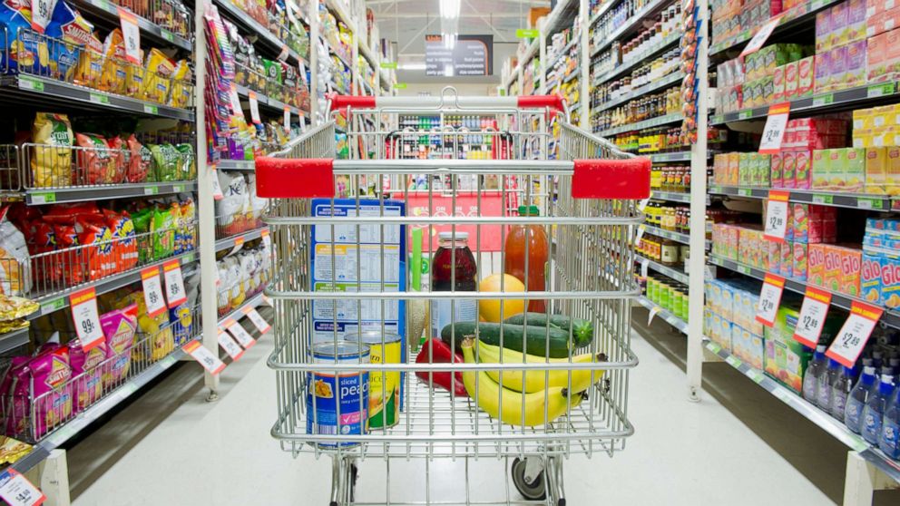 PHOTO: Shopping cart in a grocery store aisle.