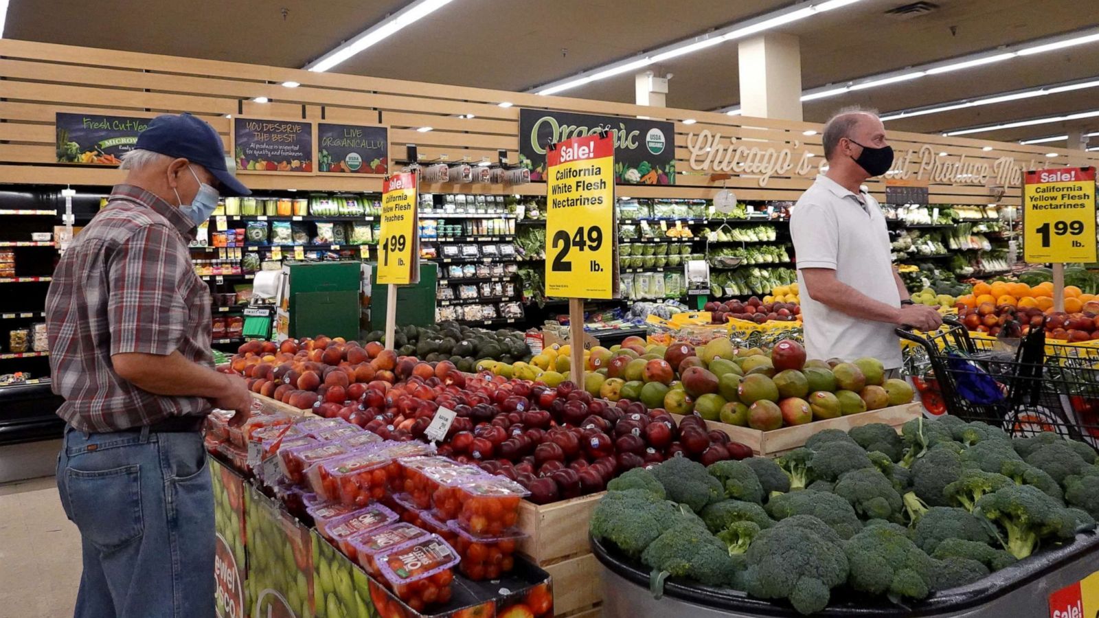 PHOTO: Customers shop for produce at a supermarket on June 10, 2021, in Chicago.