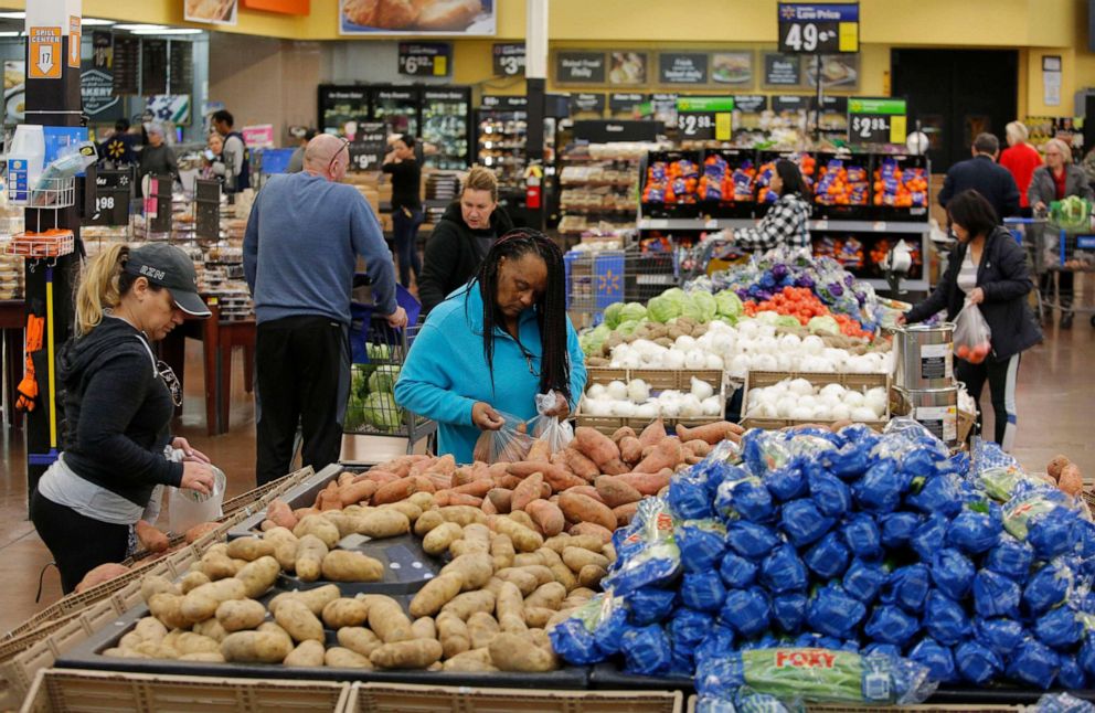PHOTO: In this Nov. 27, 2019, file photo people shop for food the day before the Thanksgiving holiday at a Walmart Supercenter in Las Vegas.