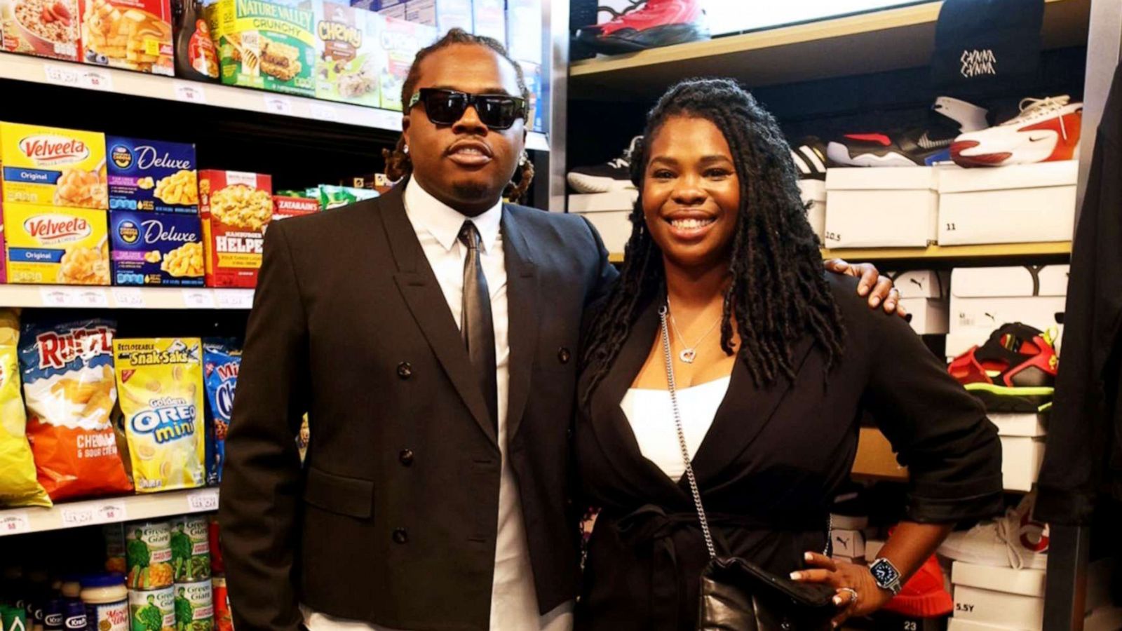 PHOTO: Hip-hop artist Gunnar poses with Goodr founder Jasmine Crowe at the grand opening of Gunna's Drip Closet and Goodr Grocery Store at McNair Middle School on Sept. 16, 2021.