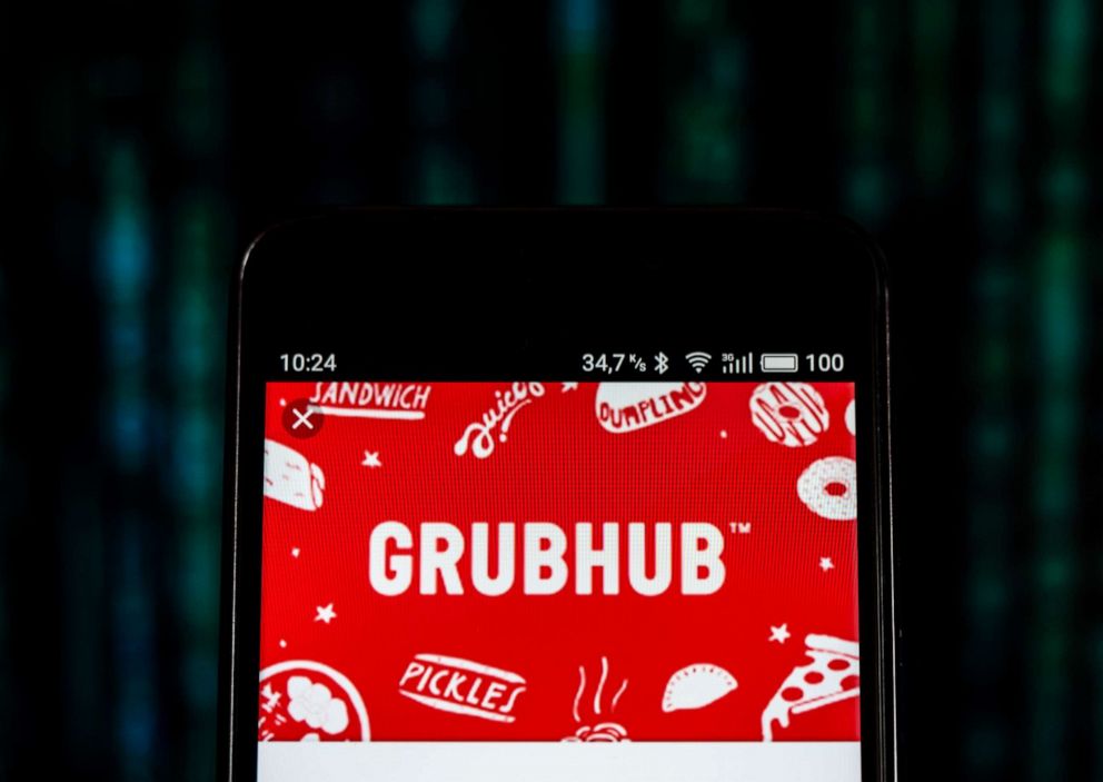 PHOTO: The GrubHub logo is displayed on a smartphone. 