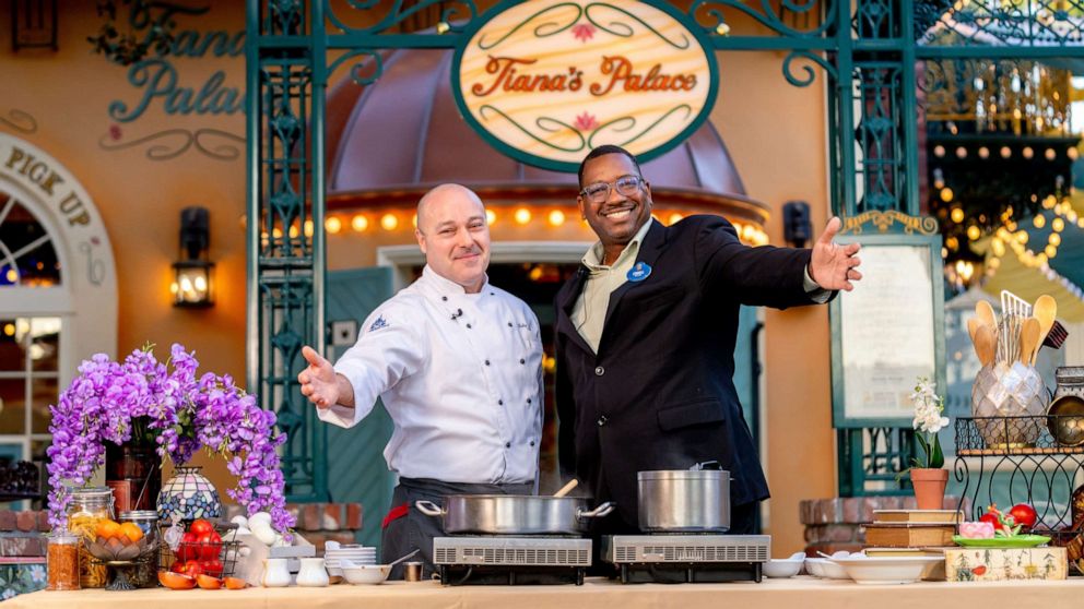 PHOTO: Chef Toby and Lindell Skinner, cooking gumbo in New Orleans Square at Disneyland.