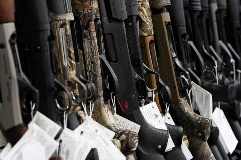 PHOTO: In this April 12, 2021, file photo, hunting rifles are displayed for sale at Firearms Unknown, a gun store in Oceanside, Calif.