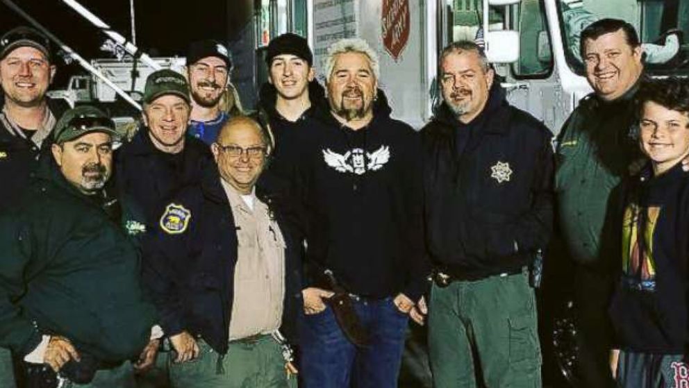 PHOTO: Celebrity chef Guy Fieri poses for a photo with law enforcement officers in an image posted to the Butte County Sheriff's Twitter account on Nov. 11, 2018.