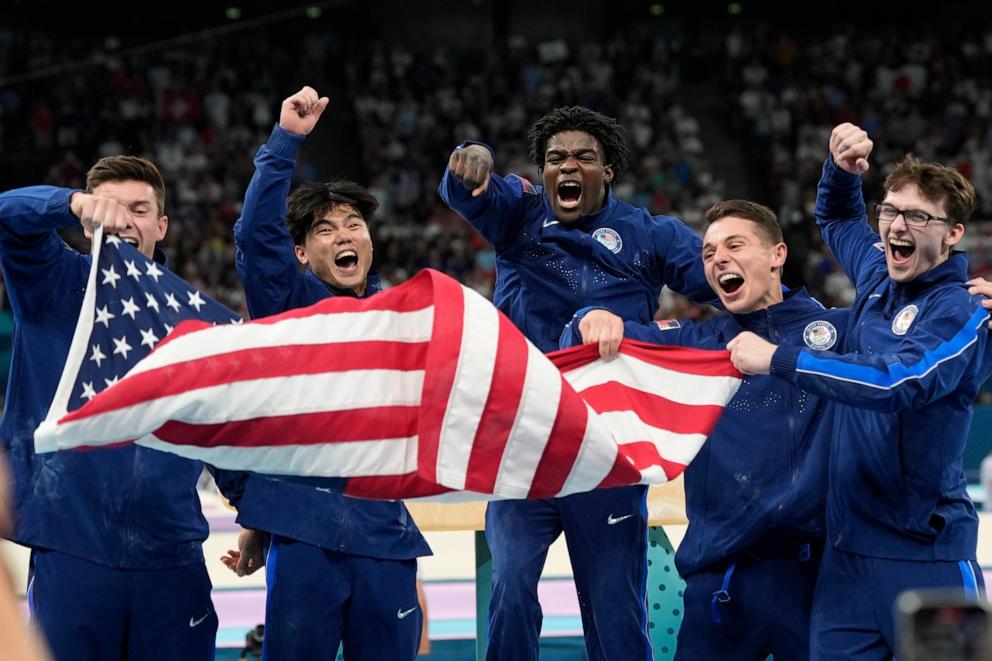 PHOTO: Team USA celebrate their bronze medal during the men's artistic gymnastics team finals round at Bercy Arena at the 2024 Summer Olympics, July 29, 2024, in Paris.