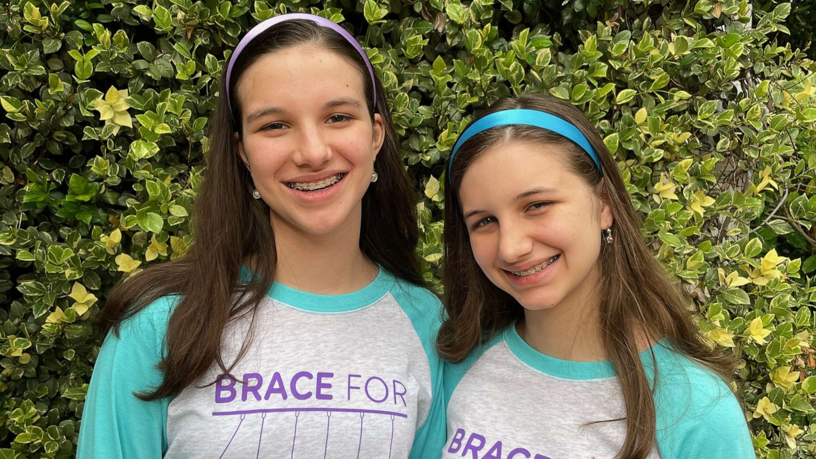 PHOTO: Delaney and Hadley Robertson, 15, created the BraceTrack app to help people who use scoliosis braces.