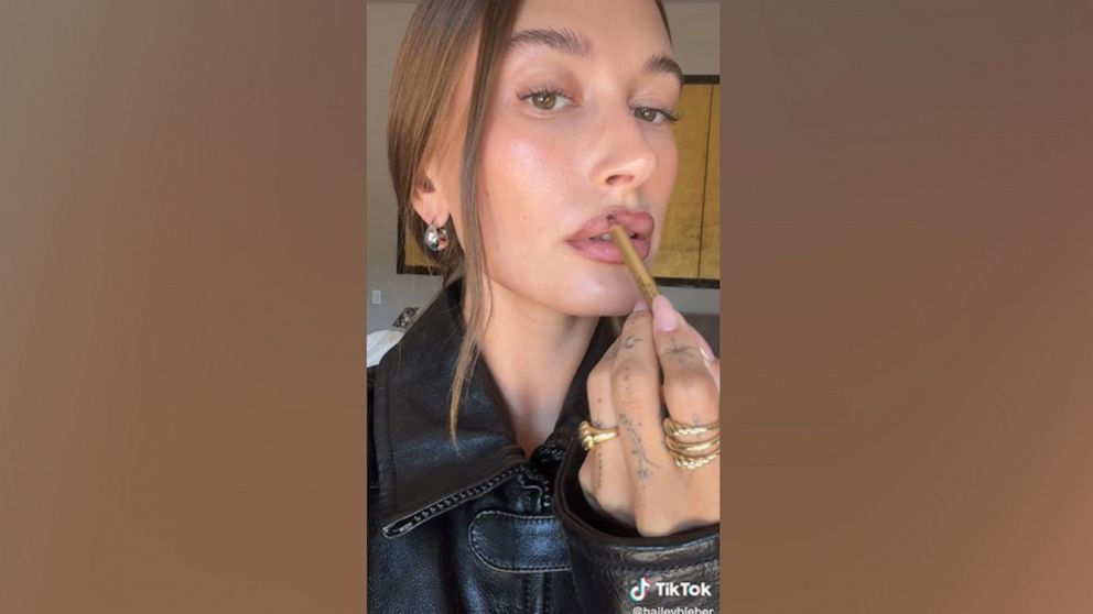 PHOTO: Hailey Bieber is facing backlash for her 'brownie glazed lips' look.