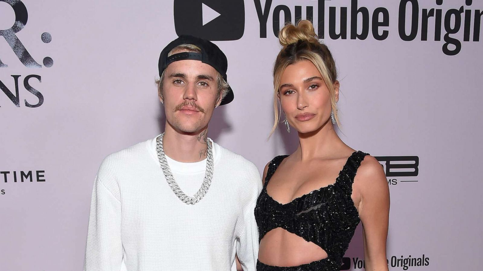 PHOTO: Canadian singer Justin Bieber (L) and wife US model Hailey Bieber arrive for YouTube Originals' "Justin Bieber: Seasons" premiere at the Regency Bruin Theatre in Los Angeles on January 27, 2020.