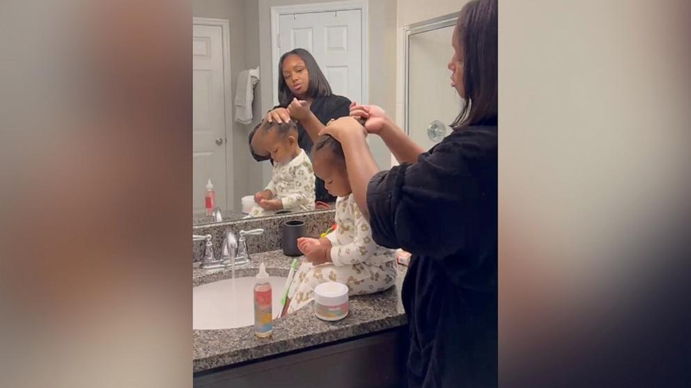 PHOTO: Darnisha Parker, a hairstylist and entrepreneur, shares snapshots of her family life on social media, including video clips of her styling her children’s hair.