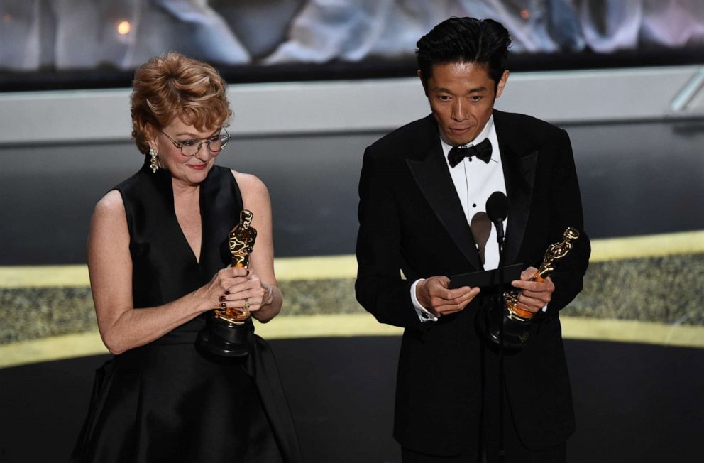 PHOTO: Vivian Baker, left, and Kazu Hiro accept the award for best makeup and hairstyling for "Bombshell" at the Oscars, Feb. 9, 2020, at the Dolby Theatre in Los Angeles.