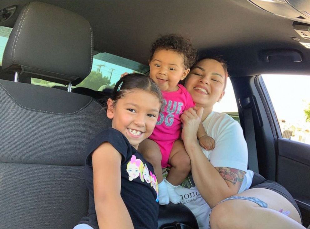 PHOTO: Maria Khachotamraz of California, poses in a recent photo with her daughters Amelia, 7 and Camila, 9 months.