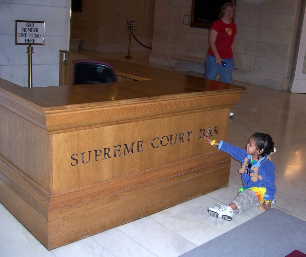 PHOTO: Haley Taylor Schlitz as a young girl at the Supreme Court in Washington, D.C. She said her parents told her her first word as a child was the word "bar."