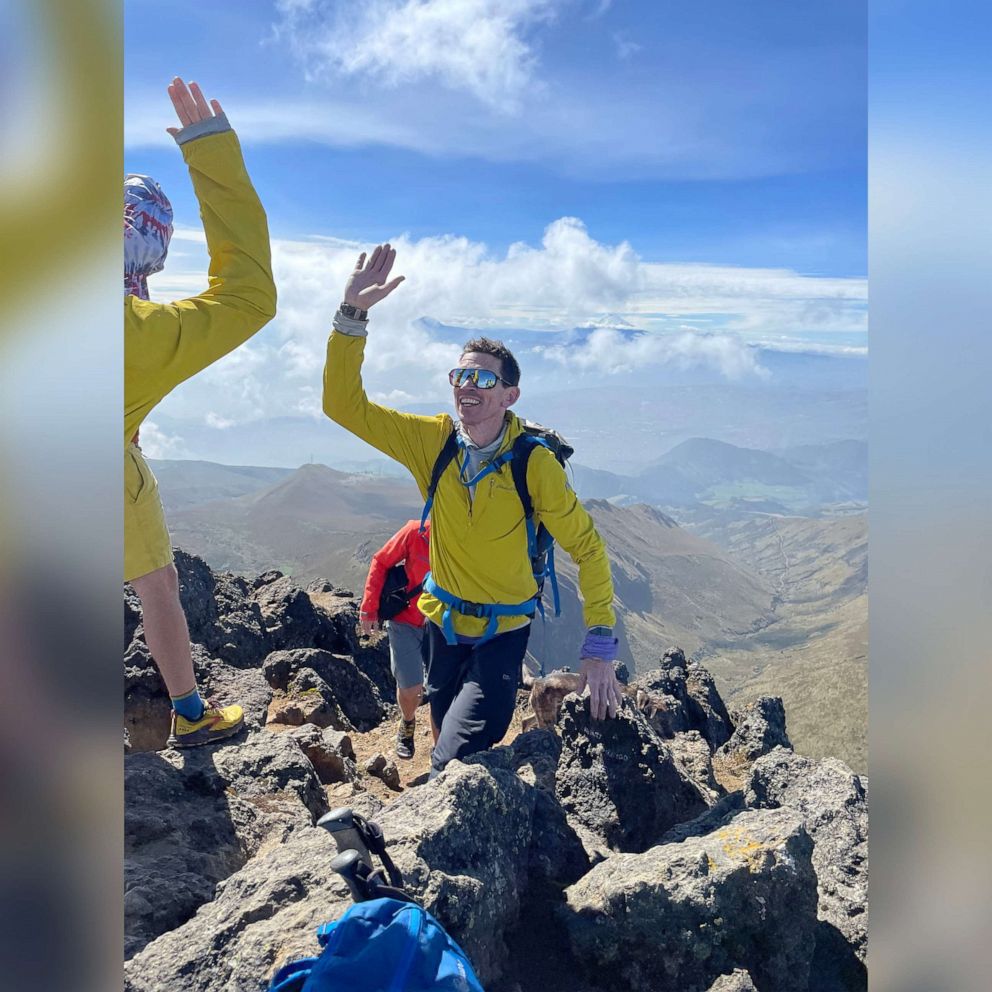 PHOTO: Mountaineer Adrian Ballinger gives a high-five while hiking with friends and family before his December 2021 wedding in Ecuador.