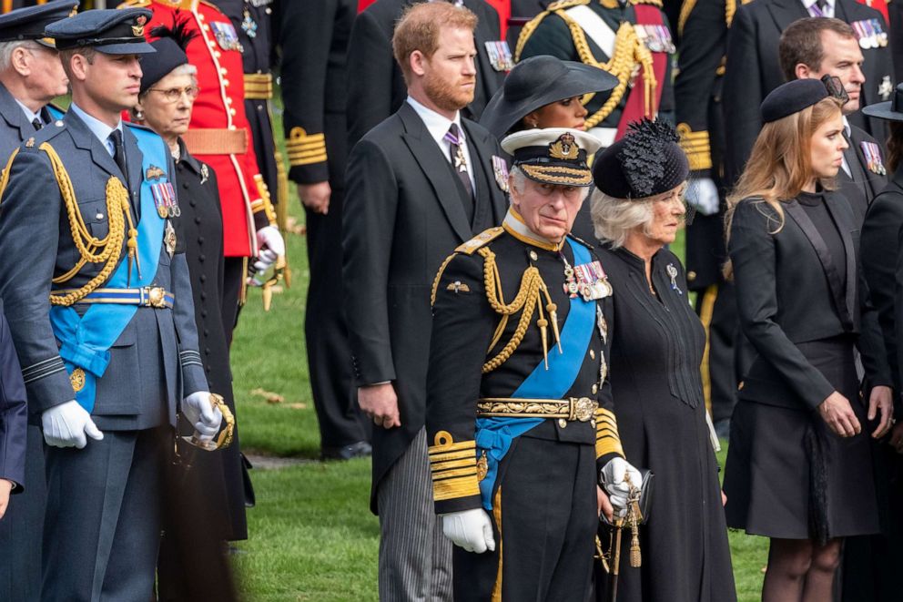 PHOTO: King Charles III, Camilla, Queen Consort, Prince William, Prince of Wales, Prince Harry, Duke of Sussex, Meghan, Duchess of Sussex, watch as the coffin of the late Queen Elizabeth leaves in the state hearse, Sept. 19, 2022 in London.