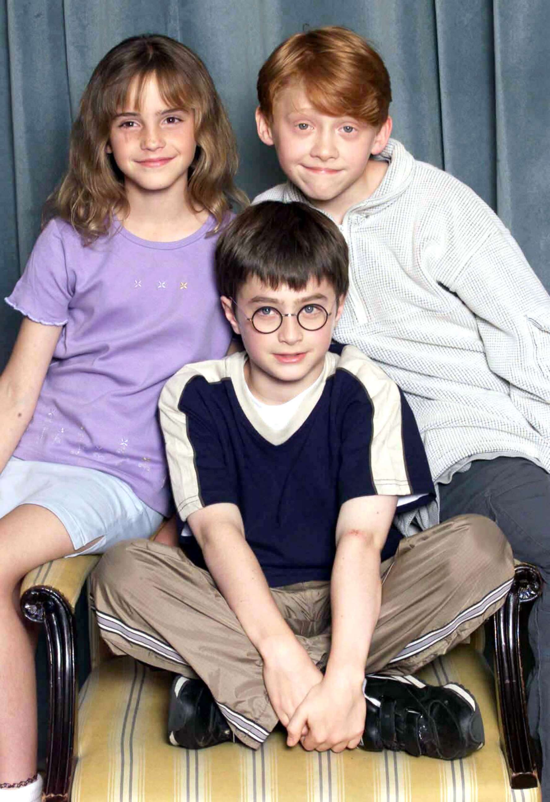 PHOTO: Emma Watson, Rupert Grint and Daniel Radcliffe attend a photocall to present the new cast of the Harry Potter Films, in London, Aug. 23, 2000.
