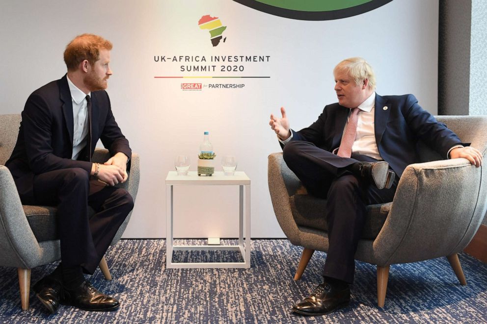 PHOTO: Prince Harry, Duke of Sussex, speaks with British Prime Minister Boris Johnson as they attend the UK-Africa Investment Summit at the Intercontinental Hotel on Jan. 20, 2020 in London.