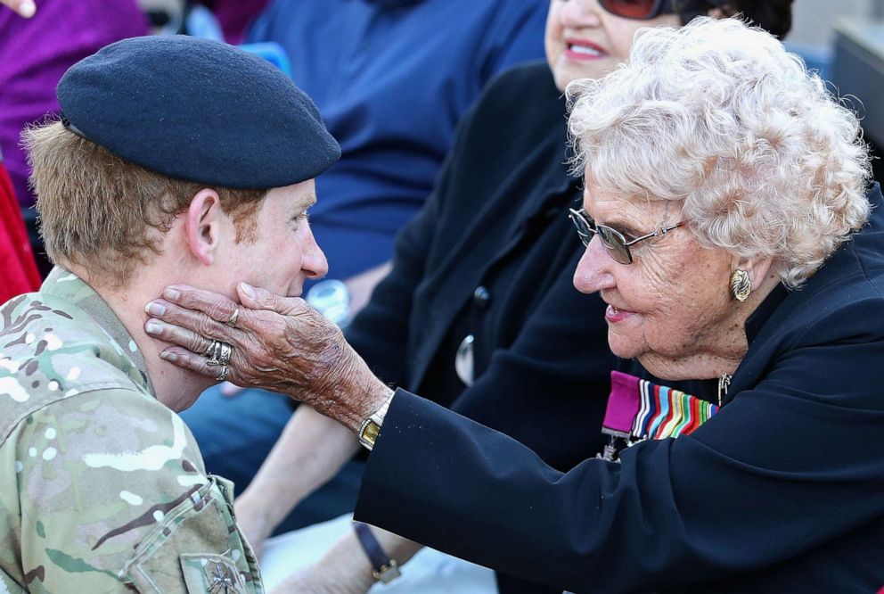 PHOTO: Prince Harry meets Daphne Dunne during a walkabout outside the Sydney Opera House, May 7, 2015, in Sydney.