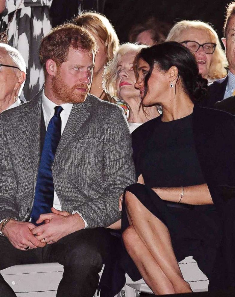 PHOTO: Prince Harry, The Duke of Sussex and Meghan Markle, The Duchess of Sussex talk during the opening ceremony of the Invictus Games in Sydney, Oct. 20, 2018.