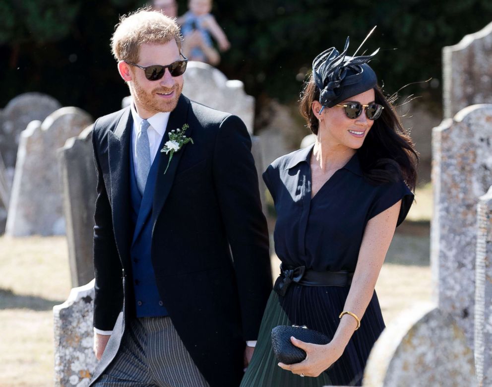 PHOTO: Prince Harry and Duchess Meghan Markle leave the wedding of Charlie Van Straubenzee and Daisy Jenks in Frensham ,U.K., Aug. 4, 2018.
