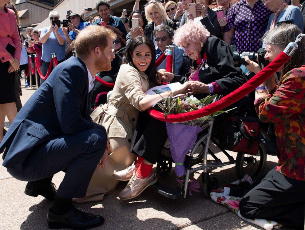 PHOTO: Prince Harry, Duke of Sussex and Meghan, Duchess of Sussex meet 98 year old Daphne Dunne during a meet and greet at the Sydney Opera House, Oct. 16, 2018, in Sydney.