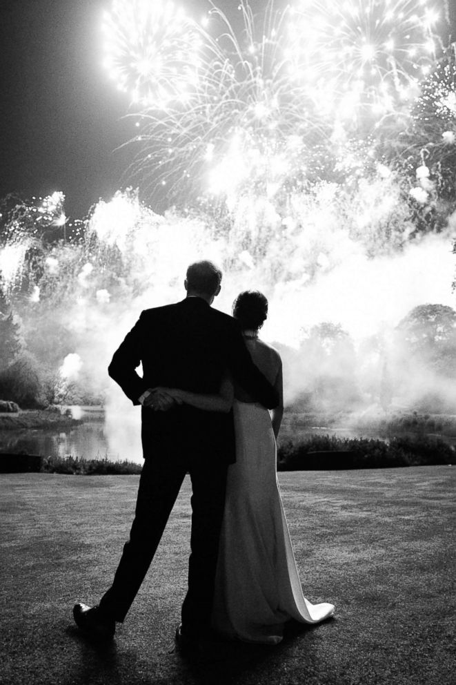 PHOTO: Prince Harry, Duke of Sussex and Meghan, Duchess of Sussex watch fireworks during their Wedding Reception at Frogmore House, May 19, 2018 in Windsor, U.K.