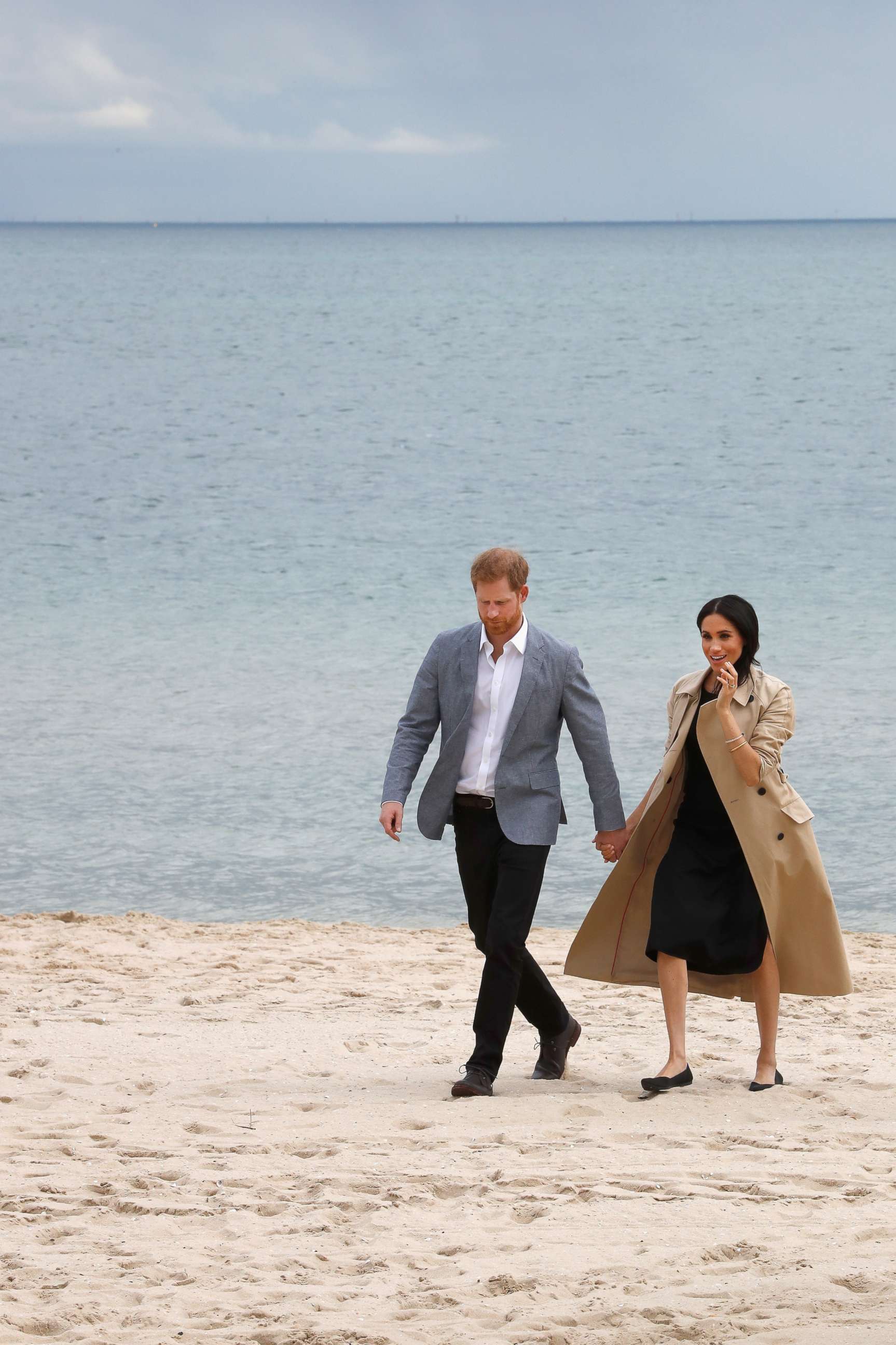 PHOTO: Prince Harry, Duke of Sussex and Meghan Markle, Duchess of Sussex attend a beach cleanup on South Melbourne Beach, Oct. 18, 2018, in Melbourne, Australia.
