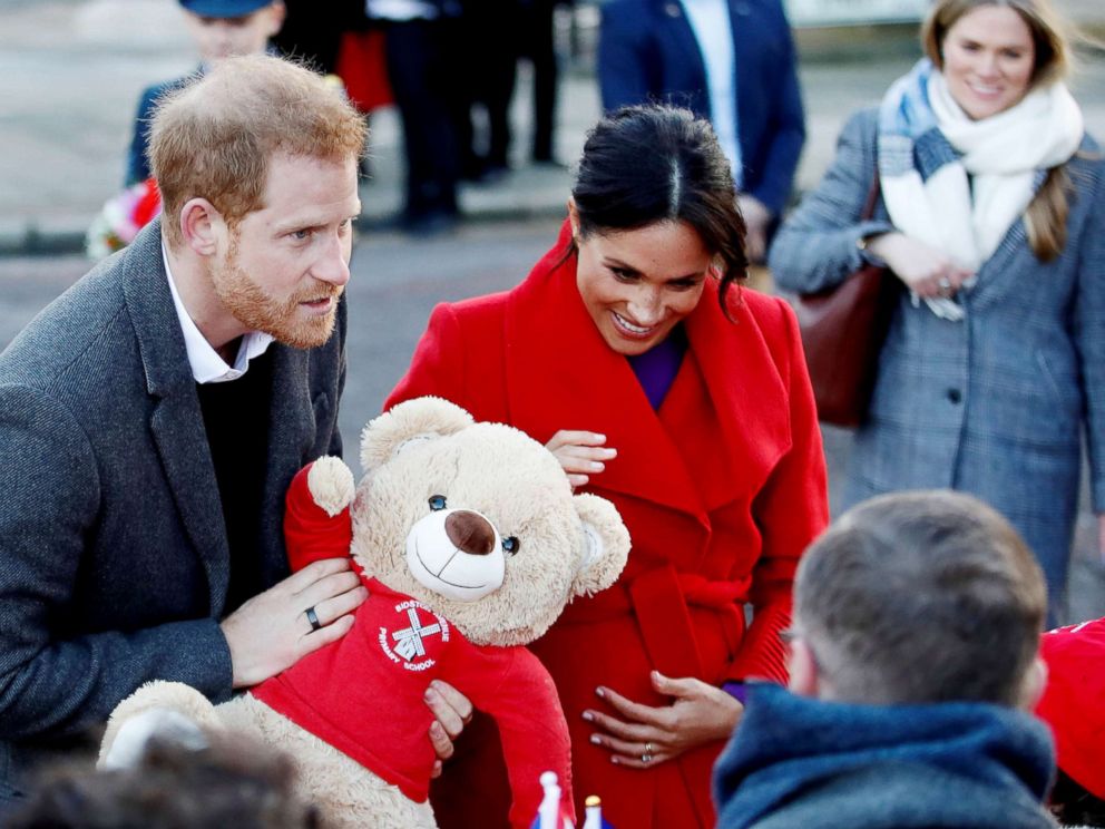 PHOTO: Britains Prince Harry and Meghan Markle, Duchess of Sussex receive a teddy bear as they visit the Hamilton Square in Birkenhead, Britain, Jan. 14, 2019.