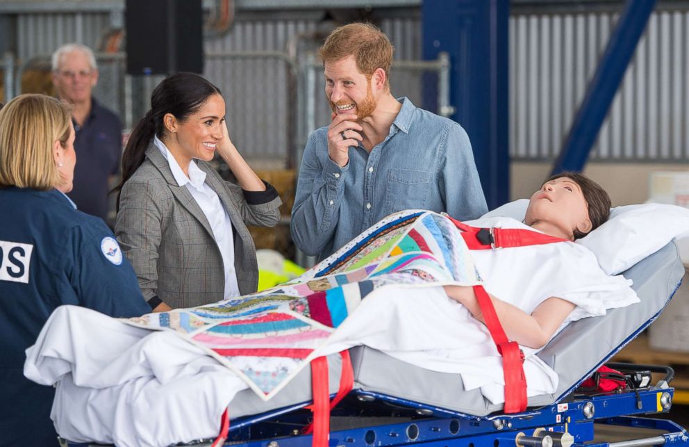 PHOTO: Meghan Markle, Duchess of Sussex and Prince Harry, Duke of Sussex look at medical training equipment, during a naming and unveiling ceremony for the new Royal Flying Doctor Service aircraft at Dubbo Airport, Oct. 17, 2018, in Dubbo, Australia.