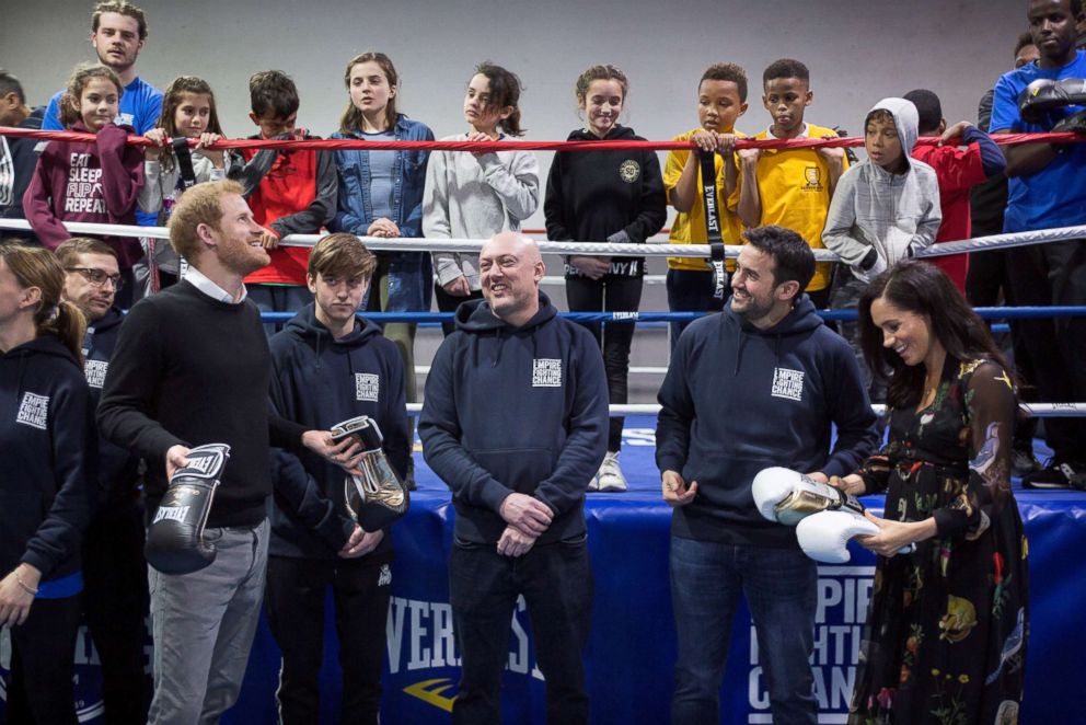 PHOTO: Britain's Prince Harry, Duke of Sussex and Meghan, Duchess of Sussex are presented with boxing gloves during a visit the Boxing Charity, Empire Fighting Chance, in the Easton area of Bristol, Britain Feb. 1, 2019.