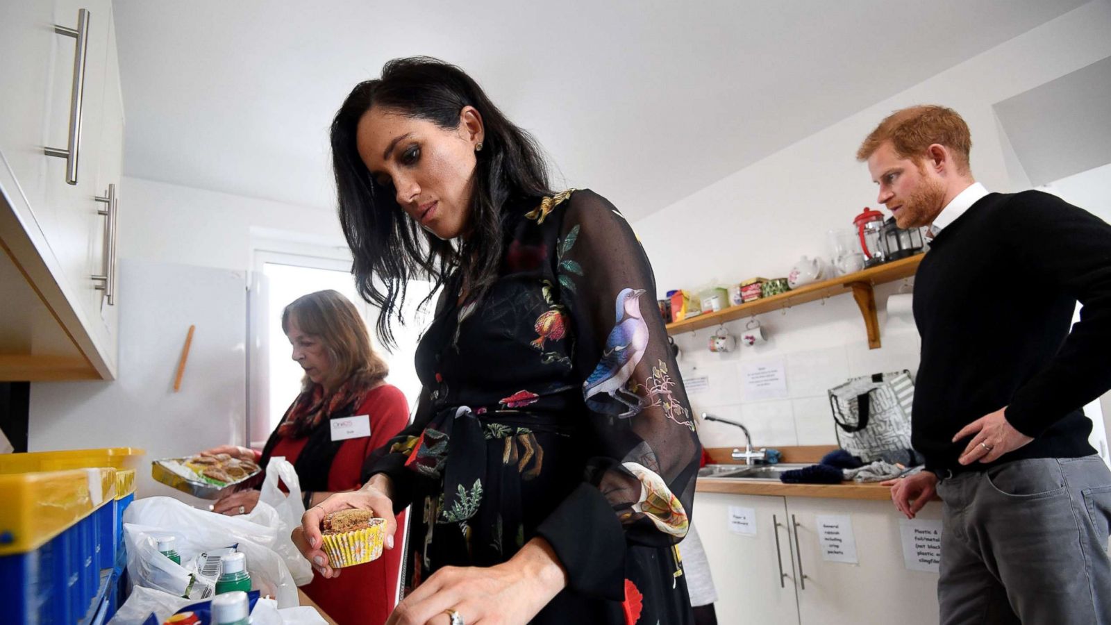 PHOTO: Britain's Meghan, Duchess of Sussex helps volunteers in the kitchen as they pack food parcels to go in the charity outreach van during a visit to One25 charity in Bristol, south west England, Feb. 1, 2019.