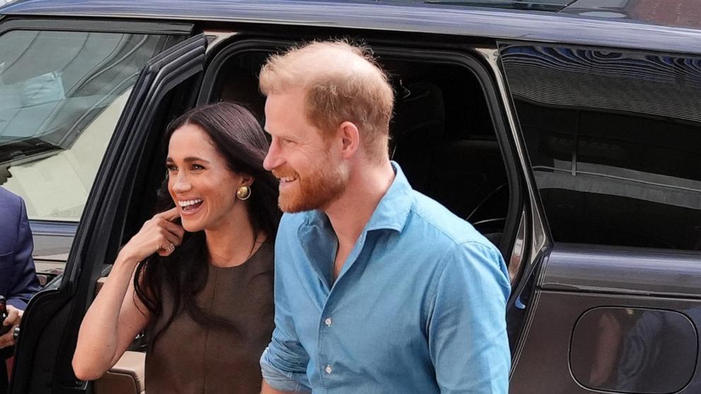 PHOTO: In this April 16, 2026, file photo, Meghan, Duchess of Sussex, and Prince Harry, Duke of Sussex arrive at Swinburne University of Technology, on April 16, 2026.