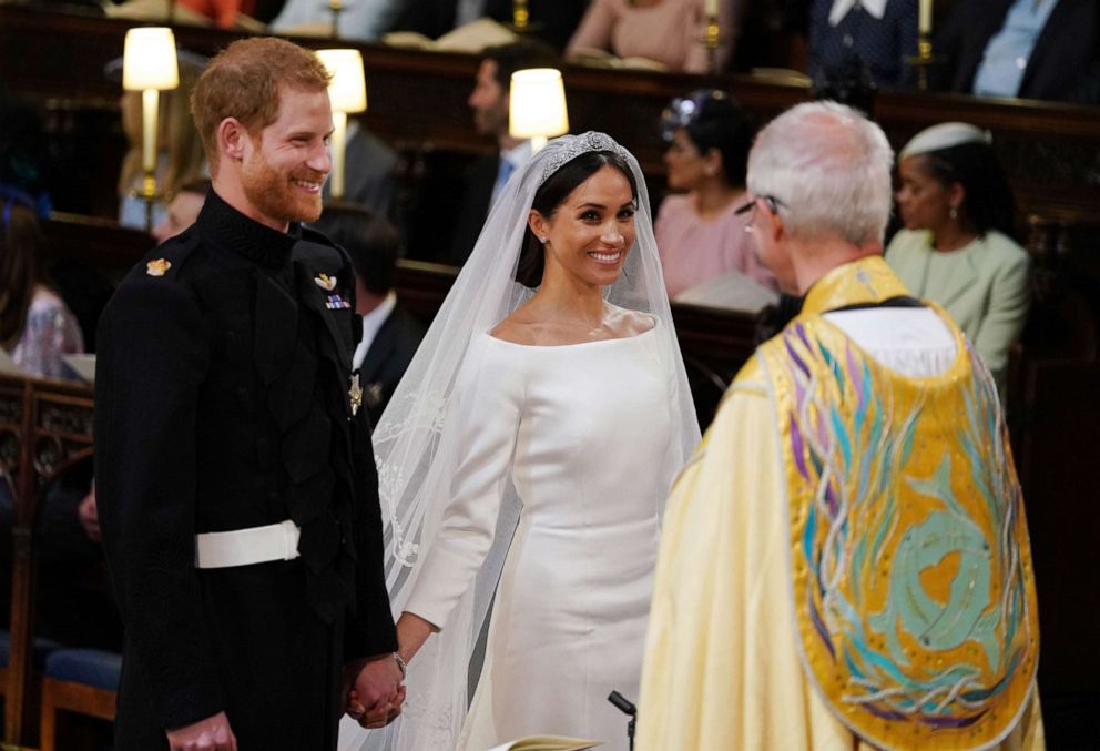 PHOTO: Prince Harry, Duke of Sussex and Meghan Markle smile during their wedding service, conducted by the Archbishop of Canterbury Justin Welby, in St George's Chapel at Windsor Castle on May 19, 2018, in Windsor, England.