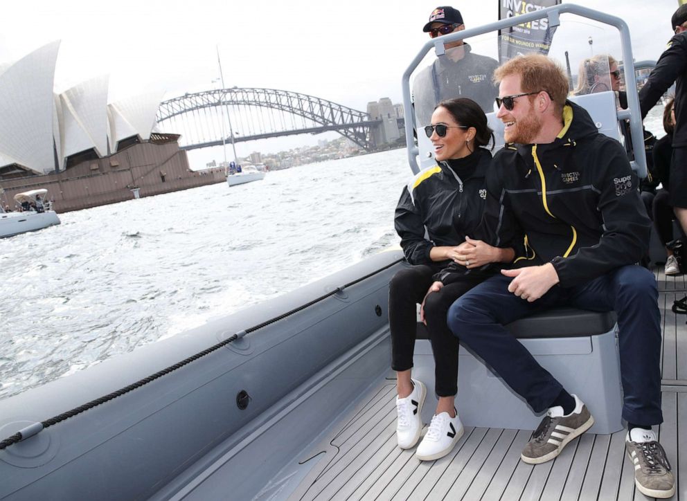 PHOTO: Prince Harry, Duke of Sussex and Meghan, Duchess of Sussex on Sydney Harbour looking out at Sydney Opera House and Sydney Harbour Bridge during day two of the Invictus Games Sydney 2018 at Sydney Olympic Park on Oct. 21, 2018, in Sydney, Australia.