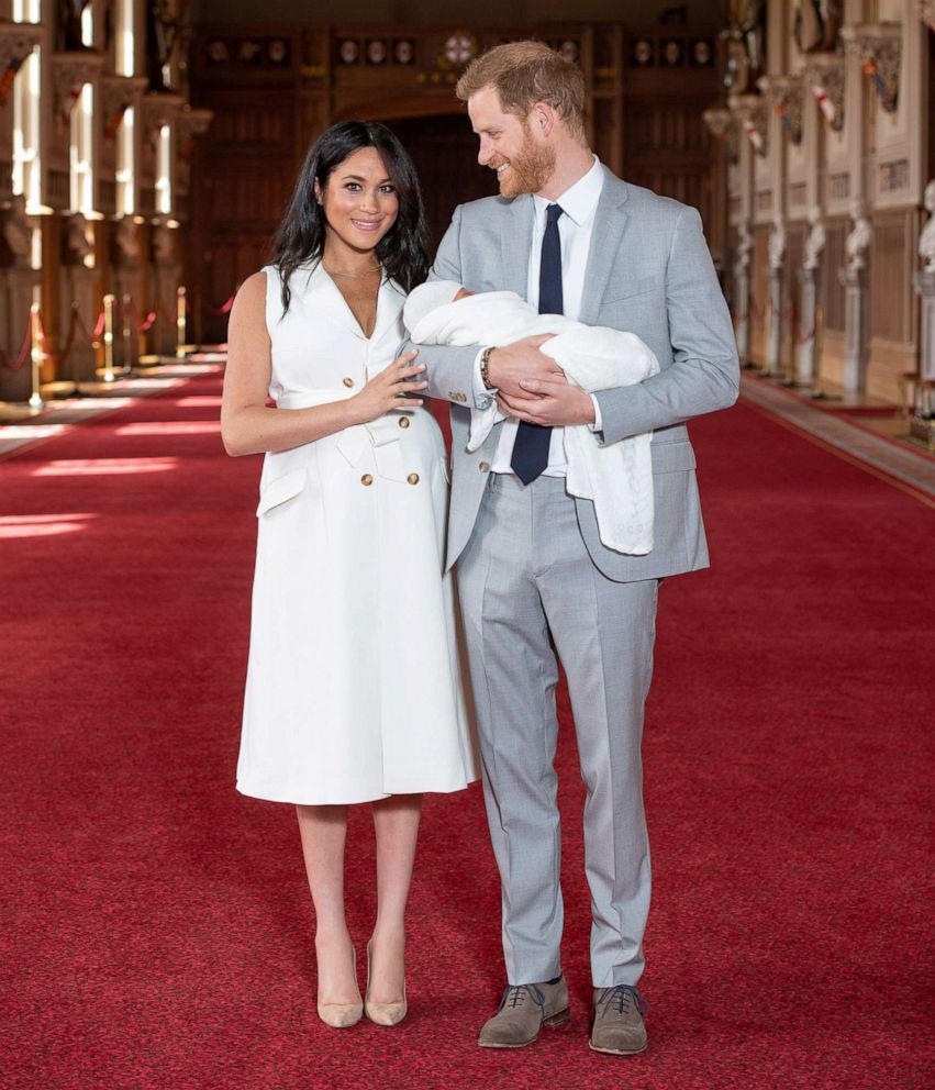 PHOTO: Britain's Prince Harry and Meghan, Duchess of Sussex, hold their newborn baby son in St George's Hall at Windsor Castle, in Windsor, England, May 8, 2019.