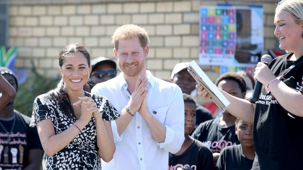 PHOTO: Prince Harry Duke of Sussex and Meghan Markle Duchess of Sussex during a visit to the Justice desk, an NGO in the township of Nyanga in Cape Town, South Africa as they begin their tour of the region, Sept 26, 2019.