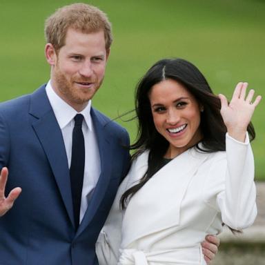 PHOTO: Prince Harry and Meghan Markle pose for a photograph in the Sunken Garden at Kensington Palace in west London.