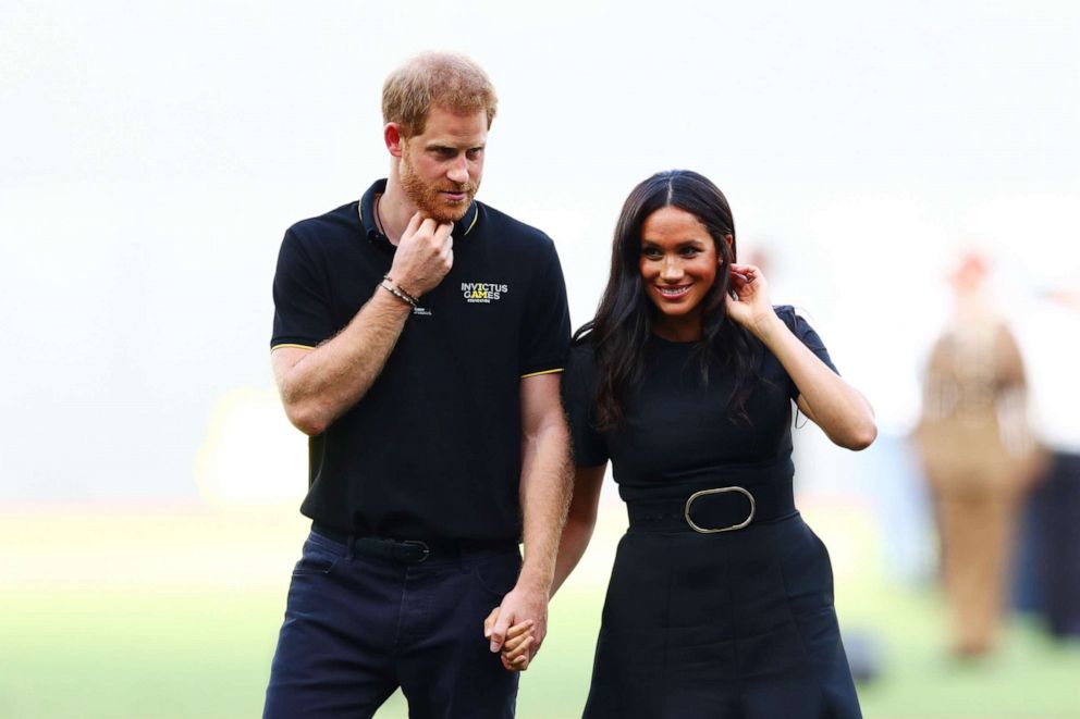 PHOTO: Prince Harry, Duke of Sussex and Meghan, Duchess of Sussex look on during the pre-game ceremonies before the MLB London Series game between Boston Red Sox and New York Yankees at London Stadium on June 29, 2019.