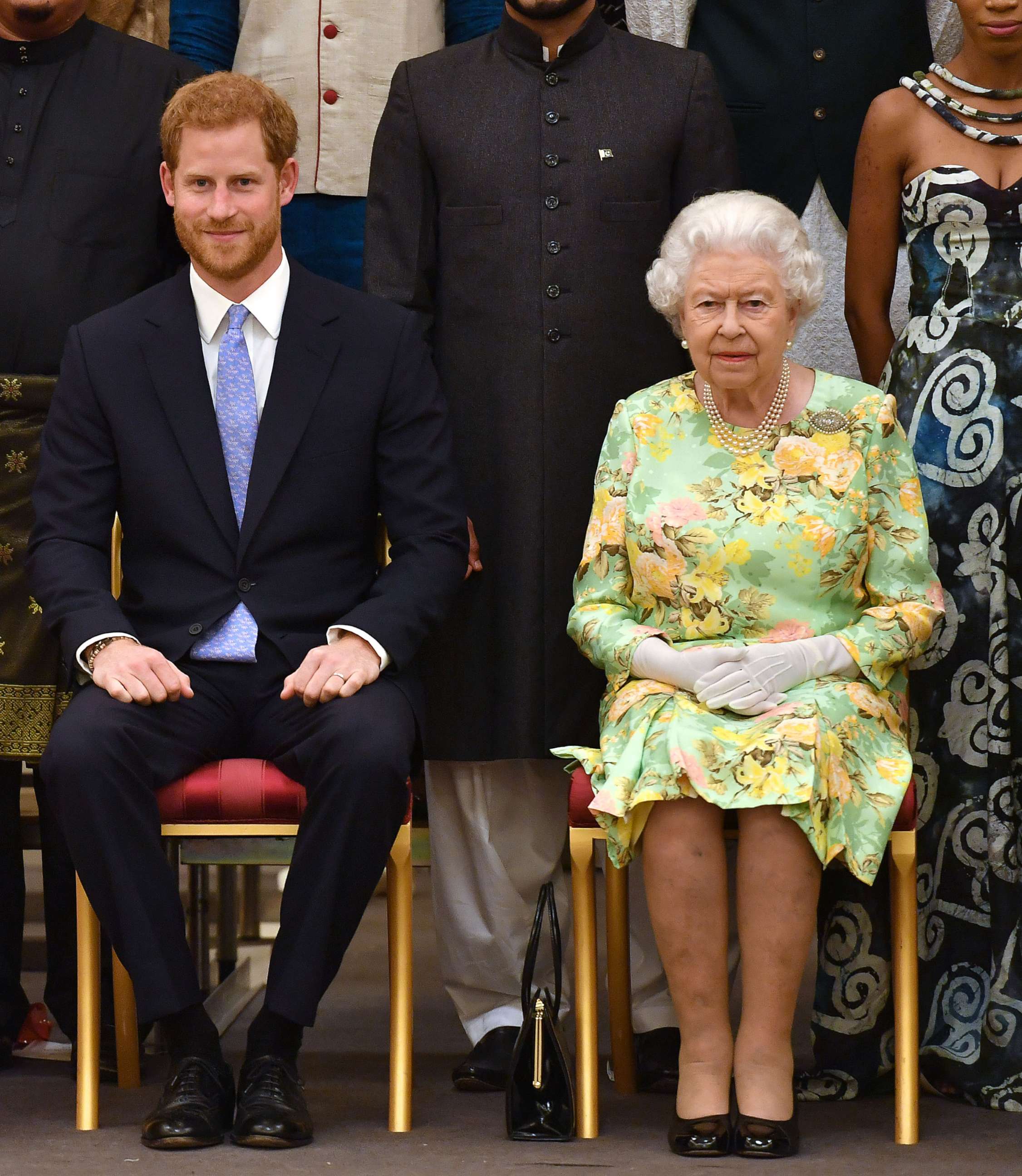 PHOTO: Prince Harry, Duke of Sussex and Queen Elizabeth II at the Queen's Young Leaders Awards Ceremony at Buckingham Palace on June 26, 2018 in London.
