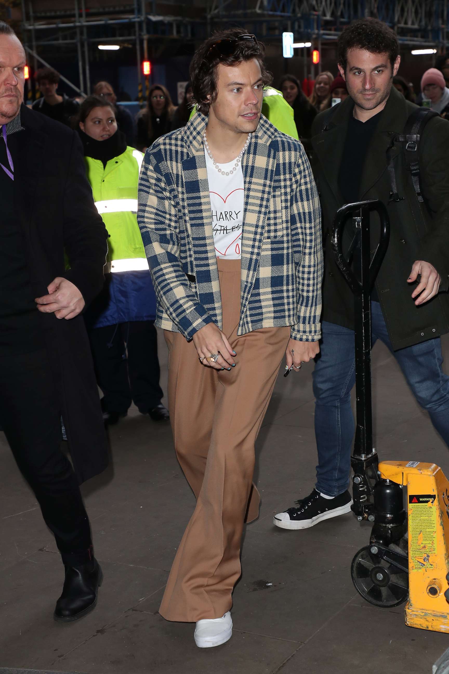 PHOTO: Harry Styles seen leaving BBC Radio One after performing in the Live Lounge on Dec. 18, 2019 in London.
