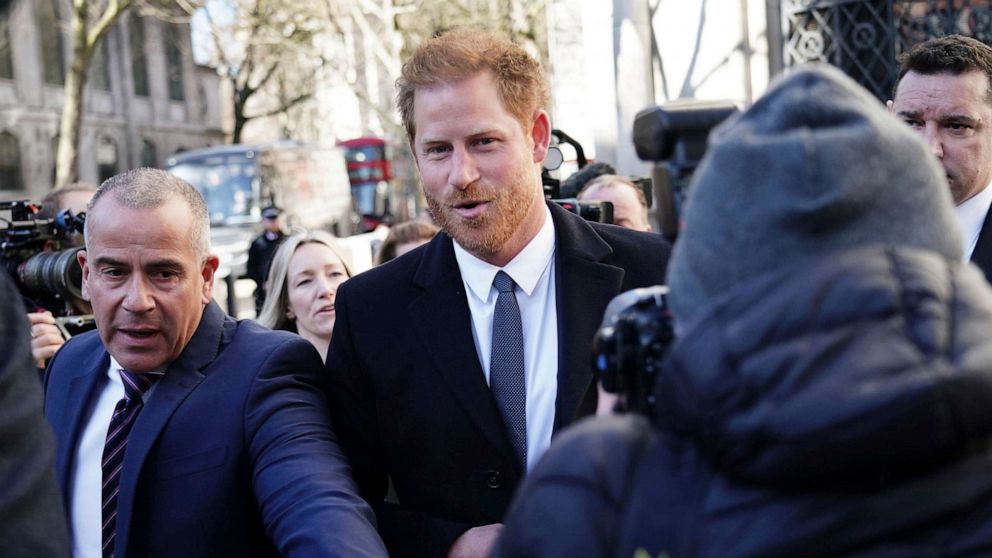 PHOTO: Britain's Prince Harry, center, arrives at the Royal Courts Of Justice, in London, March 27, 2023.